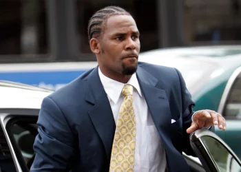 UPDATED: R. Kelly has been sentenced at last. Now a fully flagged ex-convict and jailed inmate. A tale of his long walk to jail