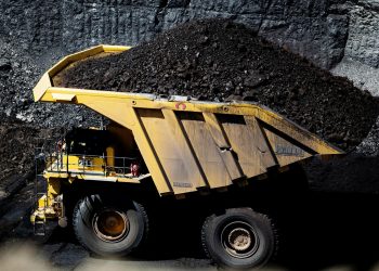 Coal mine site collapses, trapping 10 miners